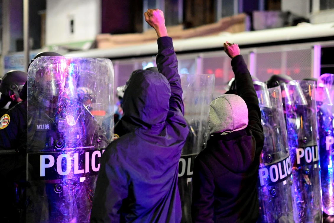 Demonstrators confront police during a rally after the death of Walter Wallace Jr., a Black man who was shot by police in Philadelphia, Pennsylvania, U.S., Oct. 27, 2020. (Reuters)