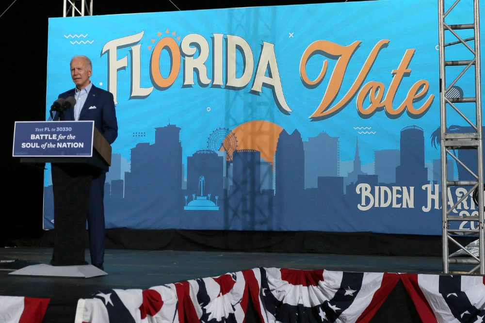 Trump and Biden clash on COVID-19 as they hold rallies in battleground state Florida