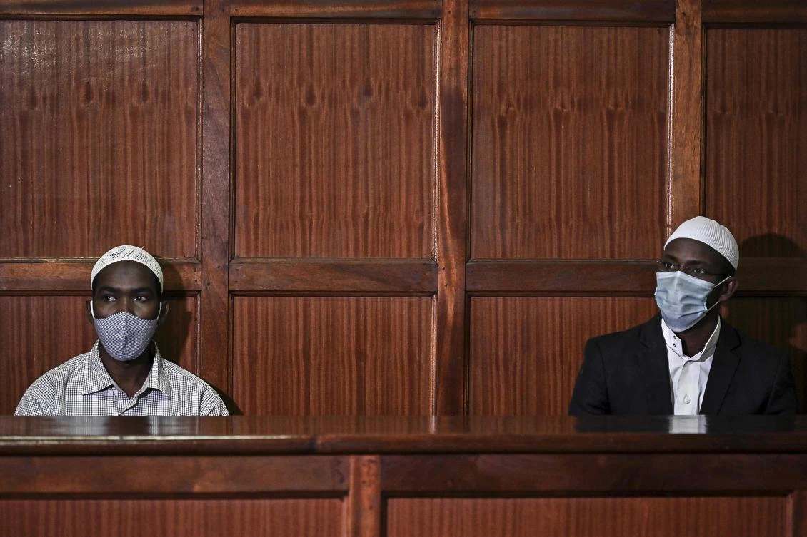 Mohamed Ahmed Abdi, right, and his co-accused Hassan Hussein Mustafa stood accused of being accessories in the Westgate Mall attack of September 2013, Nairobi, October 30, 2020. (AFP)