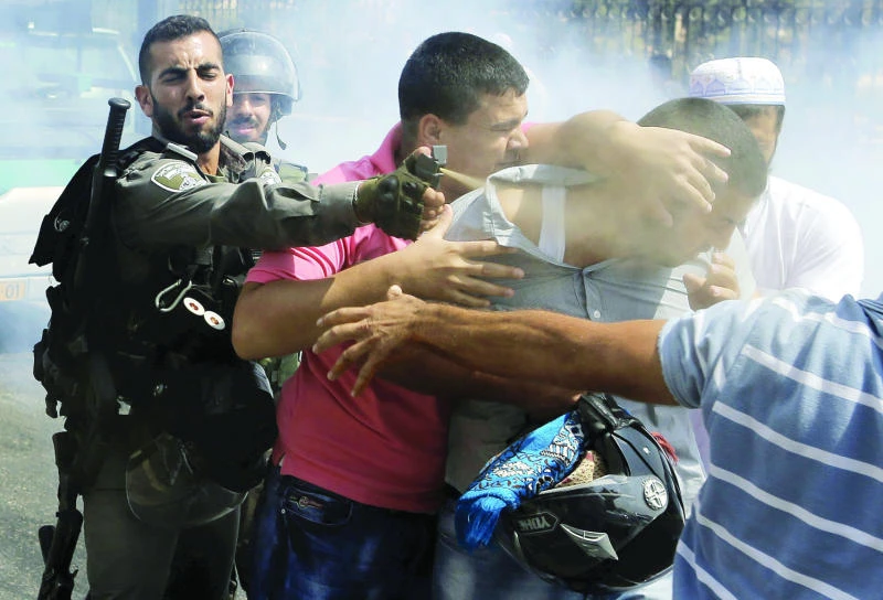 Zionists attack Abbas as settler couple slain