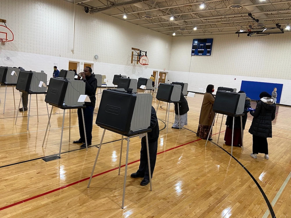 Voters turn out at the Brian Coyle Neighborhood Center in south Minneapolis early Tuesday, Nov. 3, 2020 on Election Day. (Star Tribune via AP)