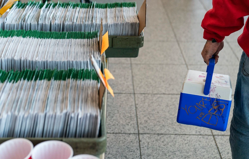 The message “You’re the Best,” written by the daughters of election inspector Mark English, decorates his lunch cooler as he arrives to count ballots on Election Day at City Hall in Warren, Michigan, Tuesday, Nov. 3, 2020. (AP)