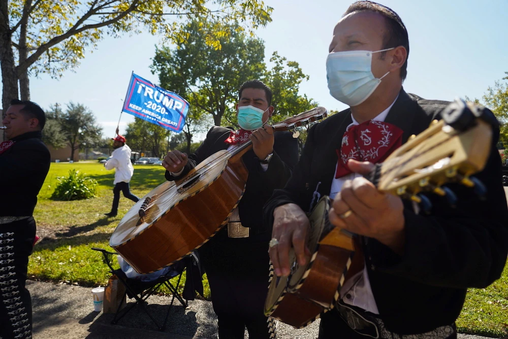 A Mariachi band play outside of a polling site on Election Day in Houston, Texas, US Nov. 3, 2020. (Reuters)
