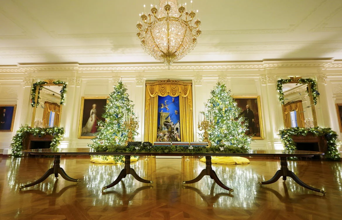 The East Room of the White House is adorned with holiday decorations during a press preview in Washington, U.S., November 30, 2020. REUTERS/Kevin Lamarque