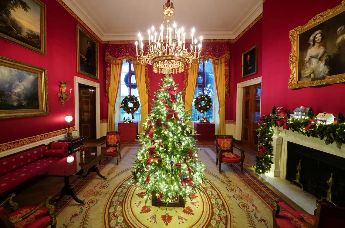 The Red Room of the White House is adorned with holiday decorations during a press preview in Washington, U.S., November 30, 2020. REUTERS/Kevin Lamarque