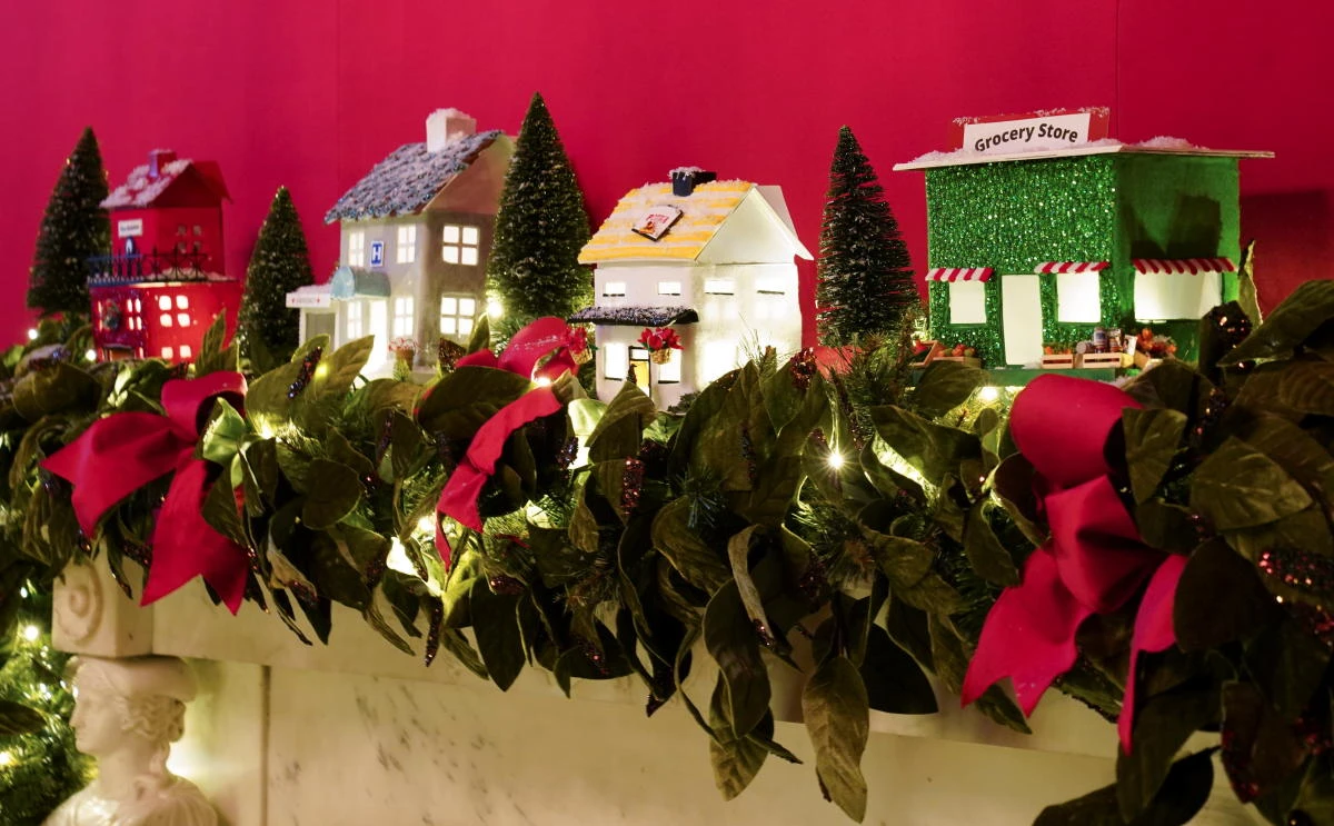 The Red Room of the White House is adorned with holiday decorations during a press preview in Washington, U.S., November 30, 2020. REUTERS/Kevin Lamarque
