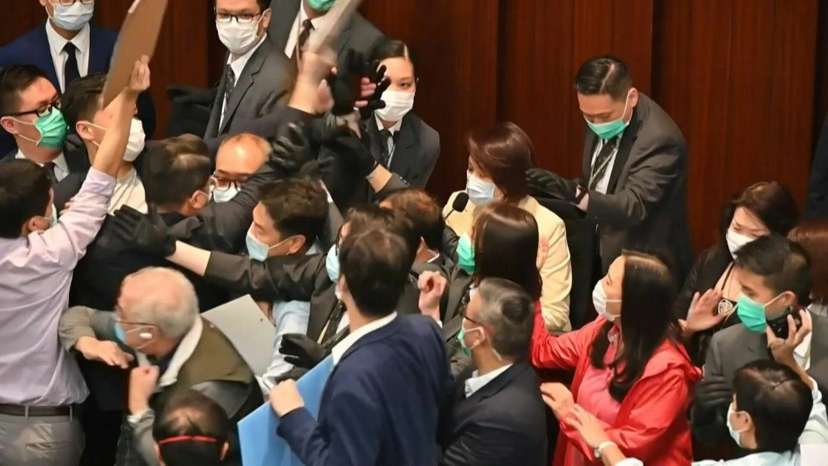 The seven pro-democratic politicians were arrested on charges of “contempt” and “interfering” with members of the city’s Legislative Council in early May, above. (AFP file photo)