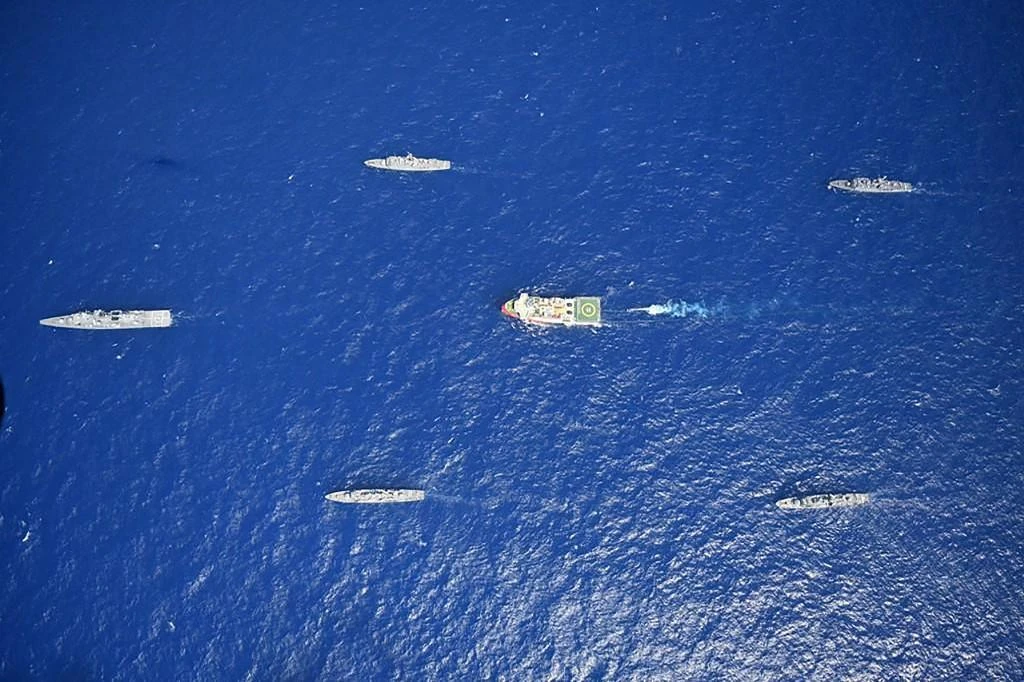 Seismic research vessel Oruc Reis, center, is escorted by Turkish Naval ships on its way for hydrocarbon exploration in the Mediterranean Sea on Aug. 10, 2020. (Turkish Defense Ministry via AFP)