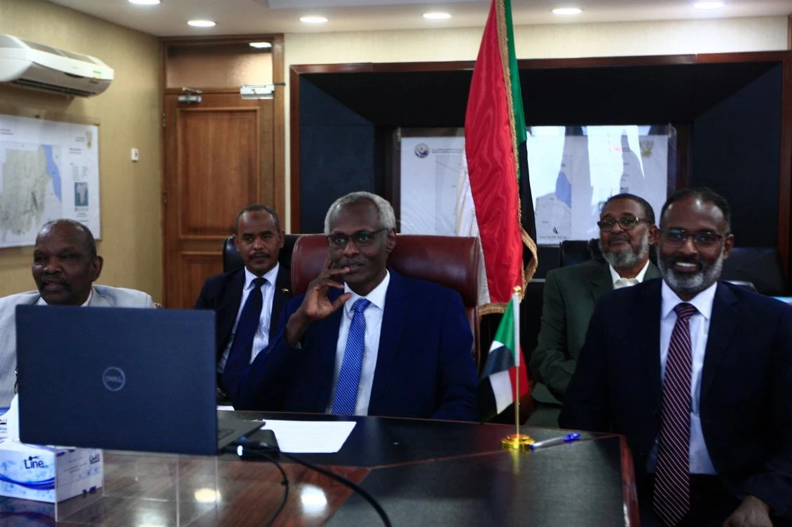 Sudan's Minister of Irrigation and Water Resources Yasser Abbas (C) participates in a videoconference with his Egyptian and Ethiopian counterparts (unseen) in the Sudanese capital Khartoum on November 1, 2020. (AFP)