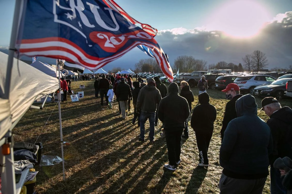Supporters of Donald Trump arrive at a campaign rally on Sunday in Washington, Michigan. (AFP)