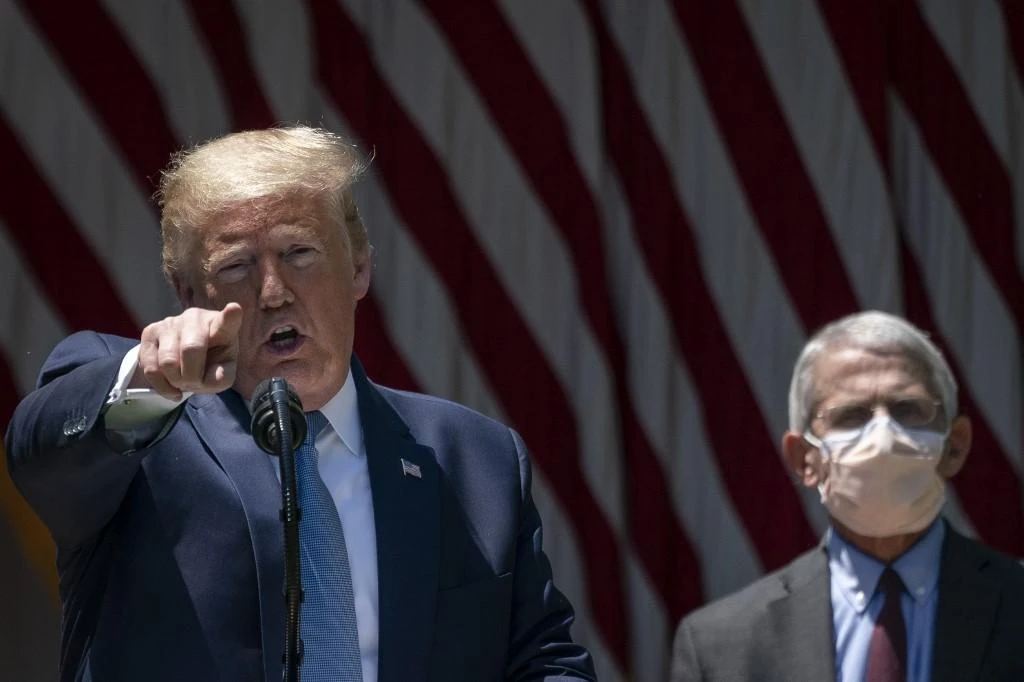 Donald Trump threatens to fire top US disease expert in rift over coronavirus