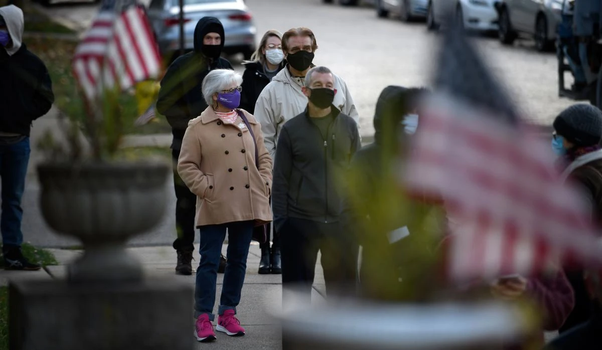 Voters wait in line at the Oakmont United Methodist Church on November 3, 2020 in Oakmont, Pennsylvania, a suburban community outside Pittsburgh. (AFP)