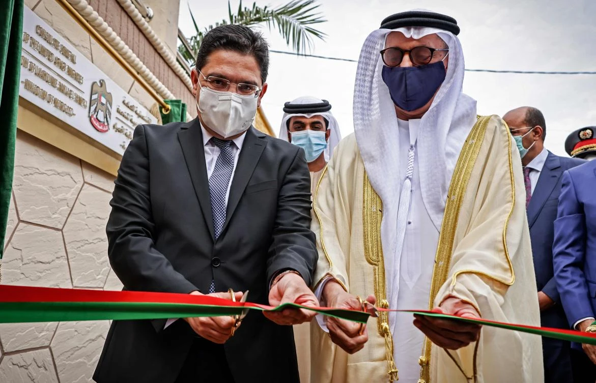 Moroccan Foreign Minister Nasser Bourita (L) and the United Arab Emirates' ambassador in Morocco, Al-Asri Saeed Ahmed Aldhaheri (R), inaugurate UAE's consulate in Laayoun, the main city in Morocco's disputed region of Western Sahara on November 4, 2020. (AFP)