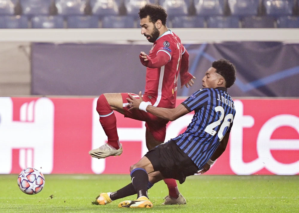 Liverpool’s midfielder Mohamed Salah vies with Atalanta’s defender Johan Mojica during a recent UEFA Champions League match. (AFP/ FILE PHOTO)