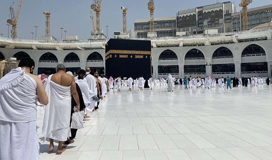Saudis and foreign residents circumambulate (Tawaf) the Kaaba in the Grand Mosque complex in the holy city of Makkah, on October 4, 2020. (AFP)