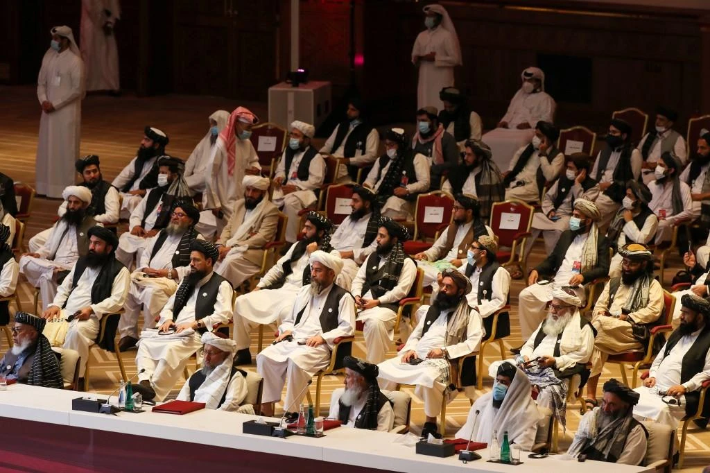 Members of the Taliban delegation attend the opening session of the peace talks between the Afghan government and the Taliban in Doha on Sept. 12, 2020. (AFP)