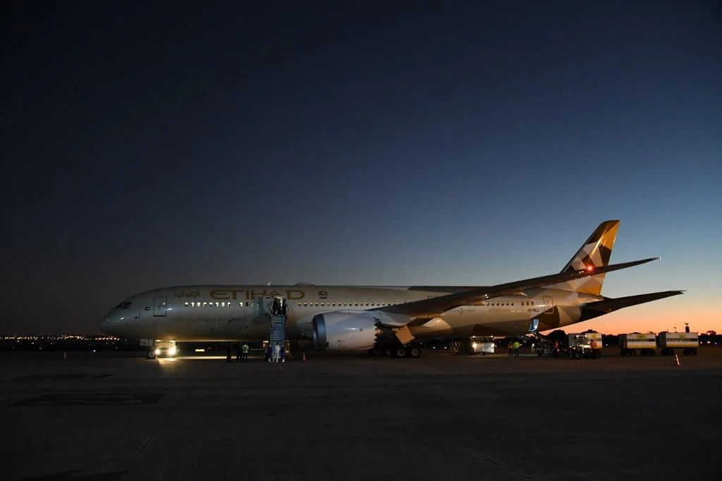 Etihad Airways will make and distribute 1.3 million masks over the next three months to flight attendants, other staff and medical professionals. (AFP)