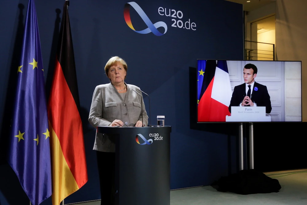 German Chancellor Angela Merkel attends a virtual news conference with French president Emmanuel Macron, on the screen, Austrian Chancellor Sebastian Kurz, Netherlands Prime Minister Mark Rutte, European Commission President Ursula von der Leyen and European Council President Charles Michel, at the chancellery in Berlin, Germany November 10, 2020. (Reuters)