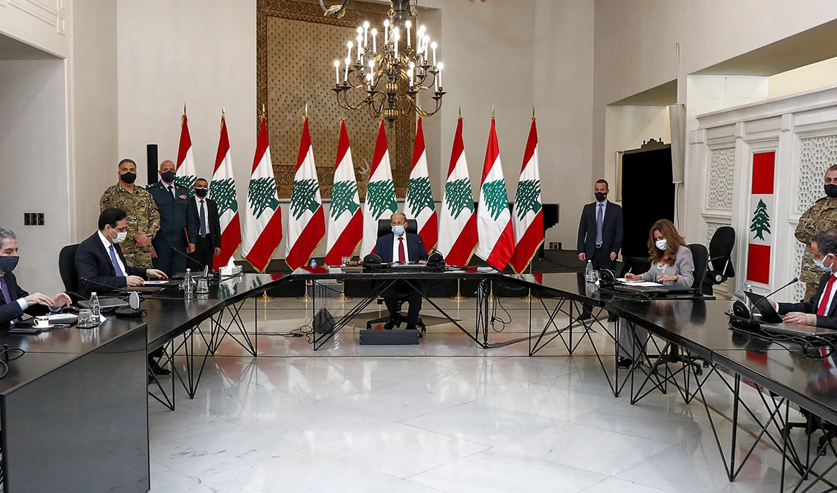 Lebanon's President Michel Aoun (C) chairing a meeting of the Supreme Defense Council at the presidential palace in Baabda, east of the capital Beirut on November 10, 2020. (AFP)