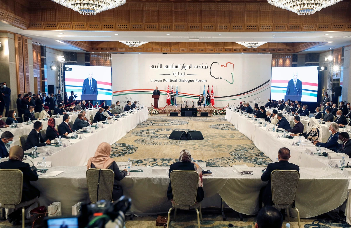 Tunisian President Kais Saied and Stephanie Williams, Acting Special Representative of the Secretary-General, attend the opening ceremony of Libya's peace talks in Tunis. (File/AP)