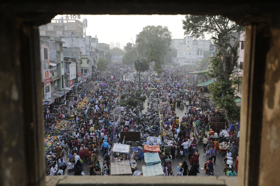 Indians throng a market for shopping ahead of Hindu festival Diwali in Ahmedabad, India, Thursday, Nov. 12, 2020. (AP)