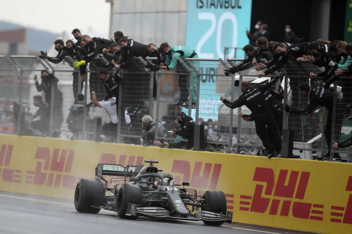 Mercedes driver Lewis Hamilton of Britain crosses the finish line to win the Formula One Turkish Grand Prix at the Istanbul Park circuit racetrack in Istanbul. (AP)