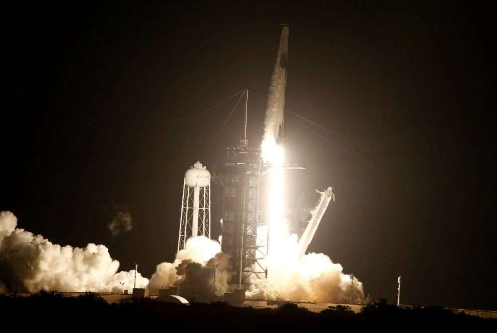 A SpaceX Falcon 9 rocket, with the Crew Dragon capsule, is launched carrying four astronauts on the first operational NASA commercial crew mission at Kennedy Space Center in Cape Canaveral, Florida on November 15, 2020. (REUTERS/Thom Baur)