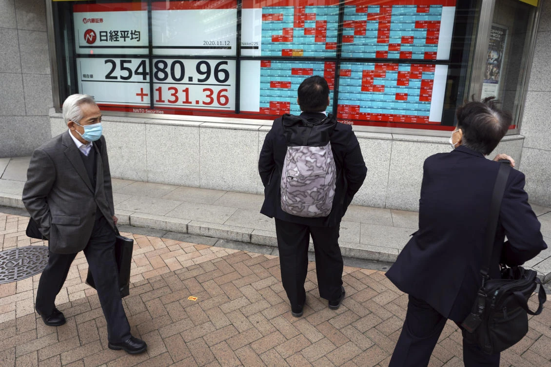 Tokyo stocks open higher as Japan exits recession