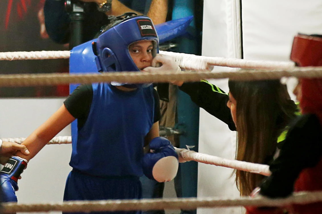 A Palestinian girl takes part in a rare boxing championship in Gaza City November 20, 2020. (Reuters)