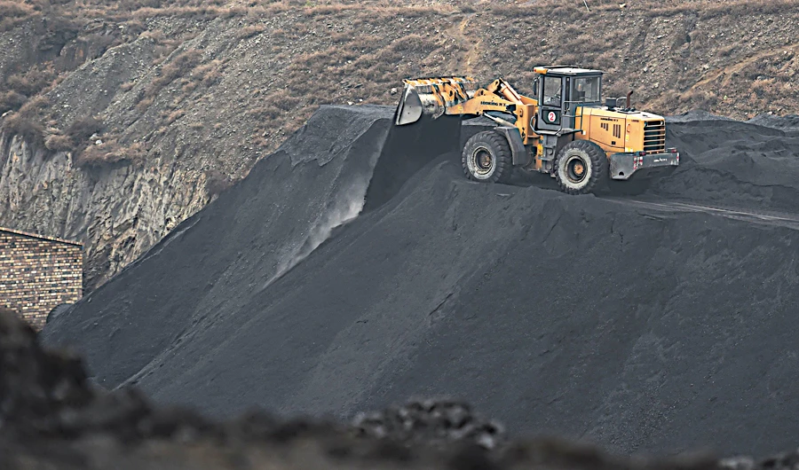 A coal mine in northern China’s Shanxi province. China must stop building new coal power plants and increase its wind and solar capacity if it wants to become carbon neutral by 2060, experts say. (AFP)