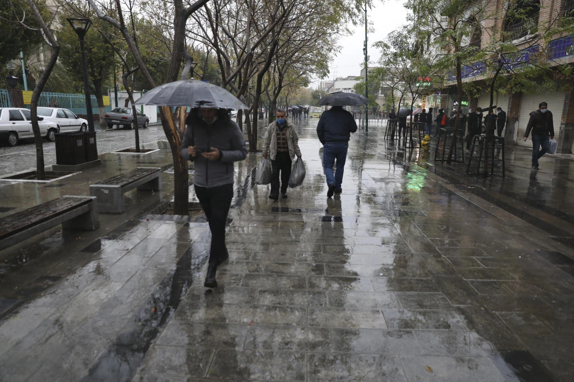 People walk through the closed Tehran's Grand Bazaar, Iran's main business and trade hub, Satuday, Nov. 21, 2020. (AP)