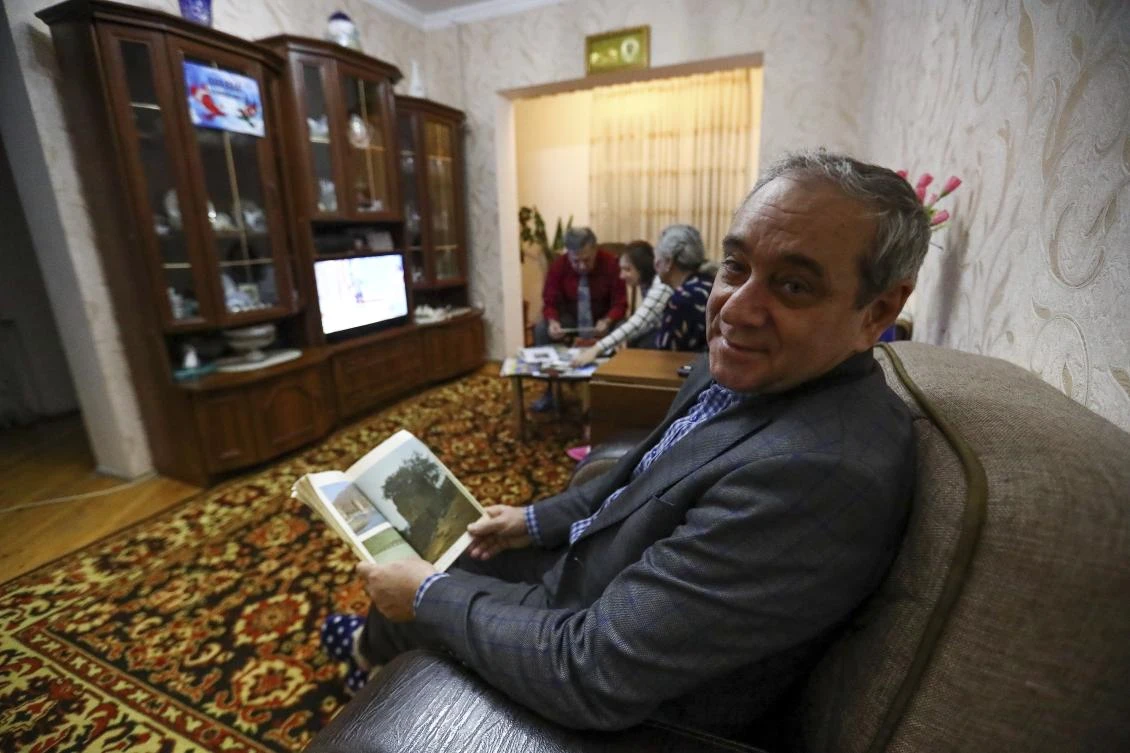 Adil Sharifov, above, left his hometown in 1992 during the first war to live in Azerbaijan’s capital, Baku. (AP)
