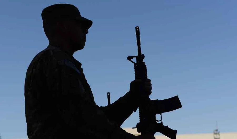 In this file photo US soldiers participate in a memorial ceremony in remembrance of those who perished thirteen years ago during the 9/11 attacks in the US, at a military base in Bagram, 50 kms north of Kabul on September 11, 2014. (AFP)