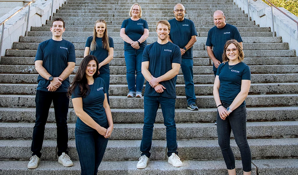 This photo shows from Aztec Media LLC shows online educational company Test Prep Insight CEO John Ross and his team posing in Auburn, Calif., in February, 2020. (AP)