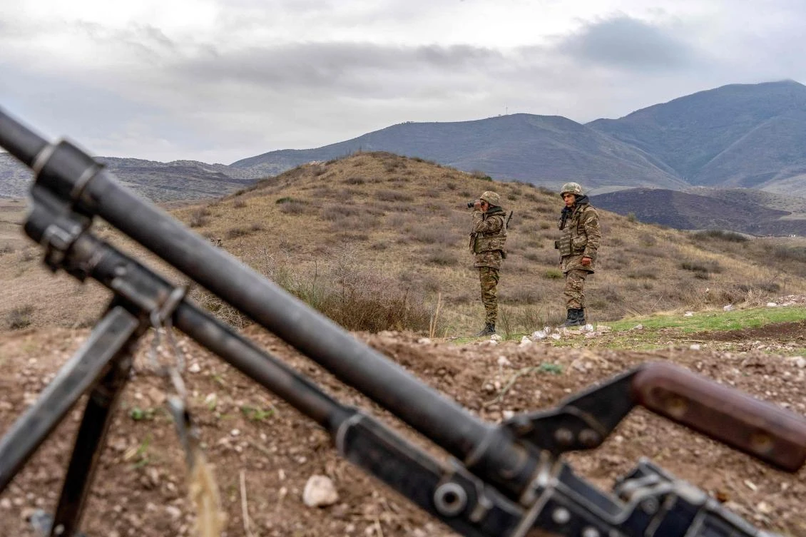 Armenian soldiers patrol at the check point nearby a demarcation line outside Askeran on Nov. 21, 2020 after a Russian-brokered cease-fire agreement. (AFP)