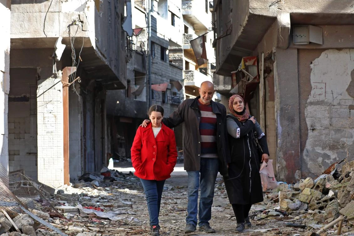 More than 400 families have returned in the last few months because they cannot afford to rent homes elsewhere after years of displacement. (AFP)