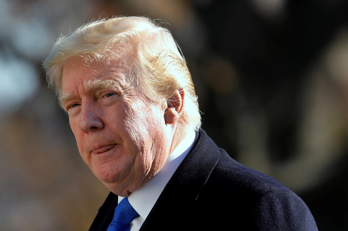 US President Donald Trump walks on the South Lawn of the White House upon his return to Washington from Camp David, U.S., November 29, 2020. (Reuters)
