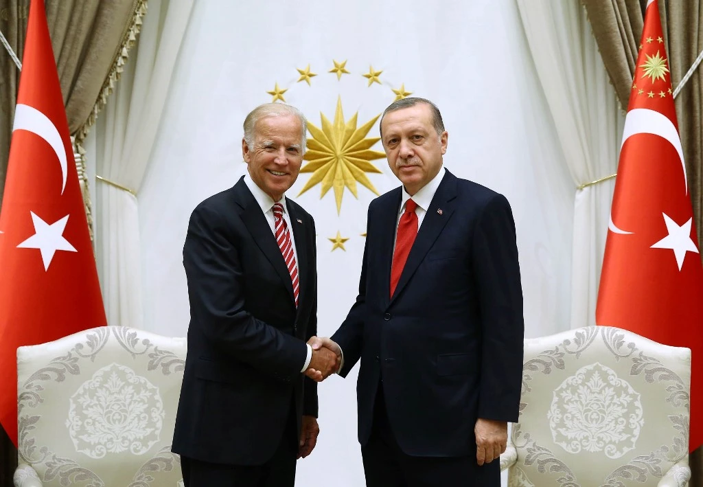 Joe Biden shakes hands with Turkish President Recep Tayyip Erdogan (R) at the Turkish Presidential Complex in Ankara. (File/AFP)