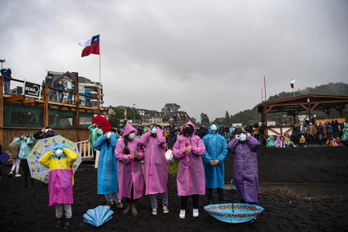 The total solar eclipse as seen from from Pucon, southern Chile, on December 14, 2020. The hopes of thousands of tourists and residents in Chile's south saw their hopes of watching a total eclipse of the sun shrink as heavy rain fell on Monday just hours before the expected event.Martin BERNETTI / AFP