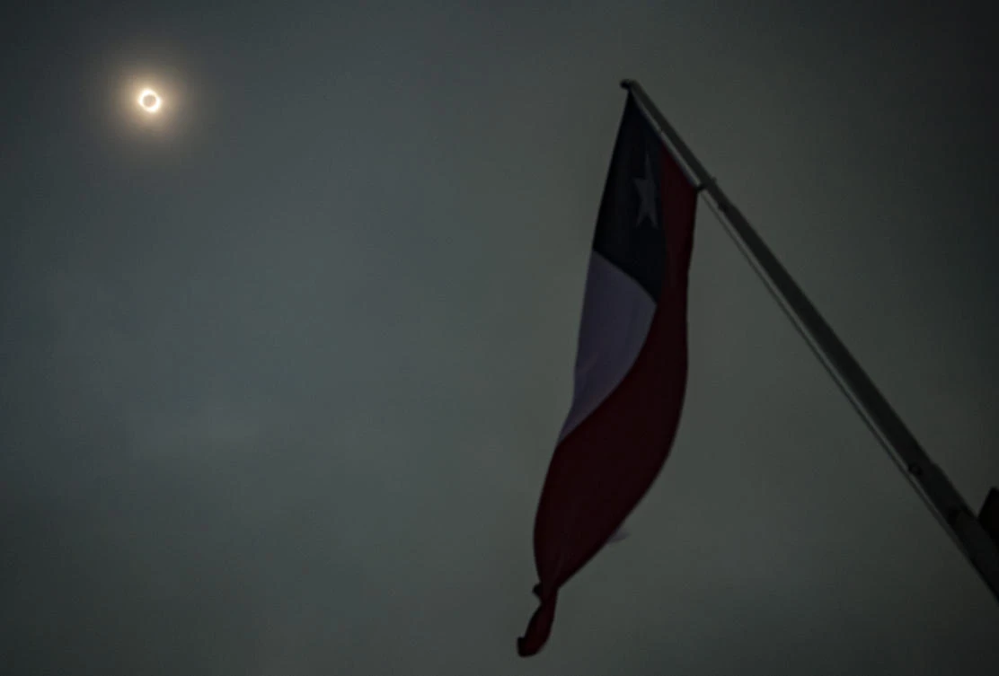 View of the total solar eclipse in Pucon, southern Chile, on December 14, 2020. The hopes of thousands of tourists and residents in Chile's south saw their hopes of watching a total eclipse of the sun shrink as heavy rain fell on Monday just hours before the expected event.MARTIN BERNETTI / AFP