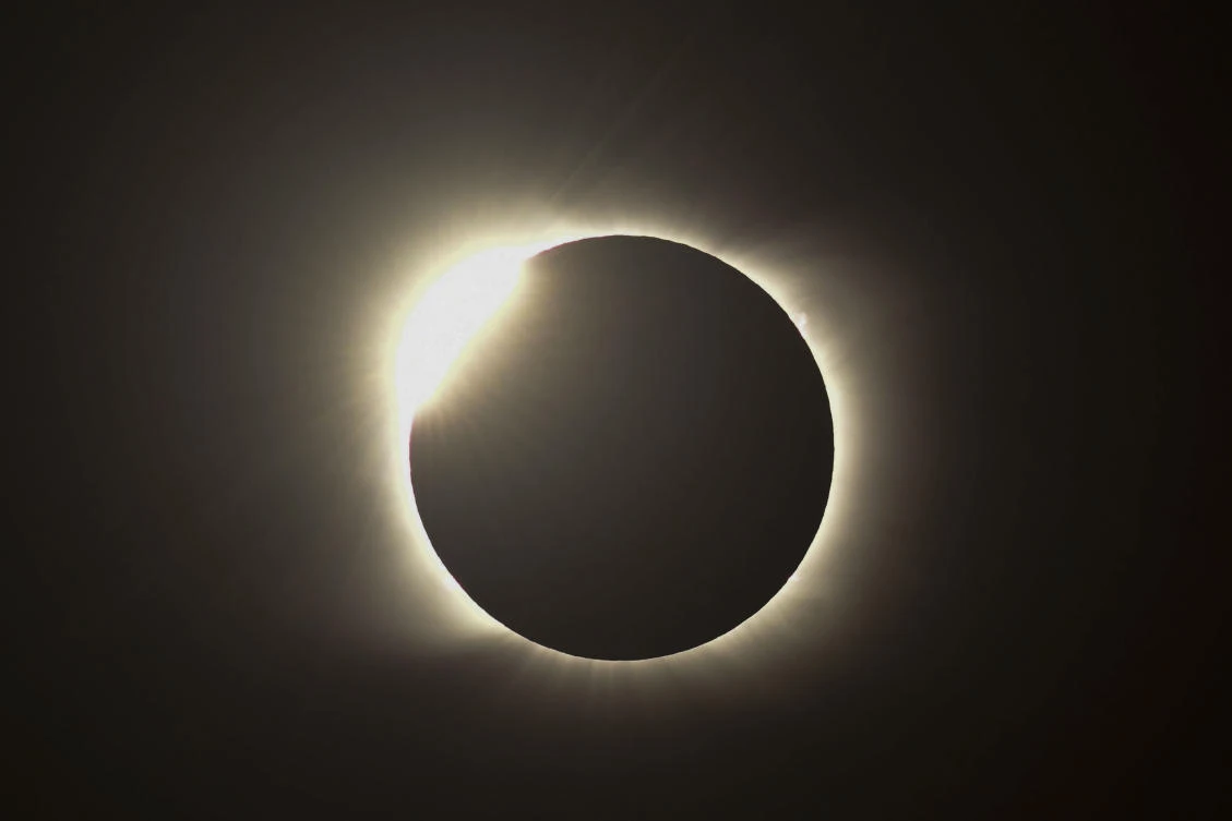 The diamond ring effect is seen during the total solar eclipse from Piedra del Aquila, Neuquen province, Argentina on December 14, 2020.RONALDO SCHEMIDT / AFP