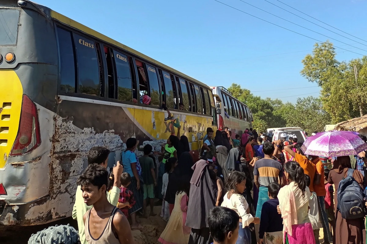 Buses wait to carry Rohingyas from a refugee camp of Cox's Bazar to Chattogram, from where they will eventually be shifted to Bhasan Char island in Cox's Bazar, Bangladesh, December 3, 2020. (Reuters)
