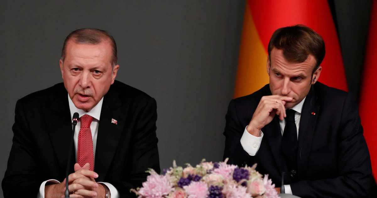 Recep Tayyip Erdogan has suggested that Emmanuel Macron get ‘mental checks’ and urged Turkish people to boycott French-labelled products. (Reuters)