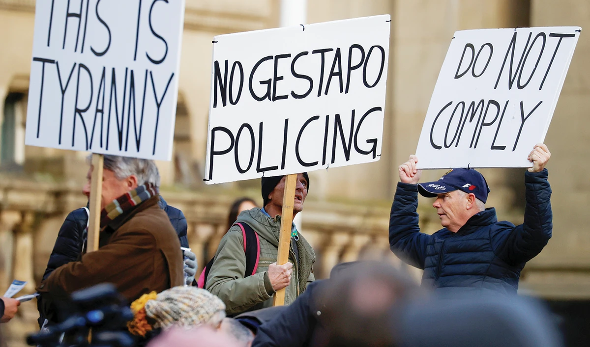 People participate in an anti-lockdown demonstration on Saturday amid the coronavirus disease outbreak in Birmingham, Britain. (Reuters)
