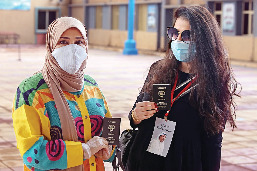 Kuwaitis vote in first parliamentary election since accession of new emir