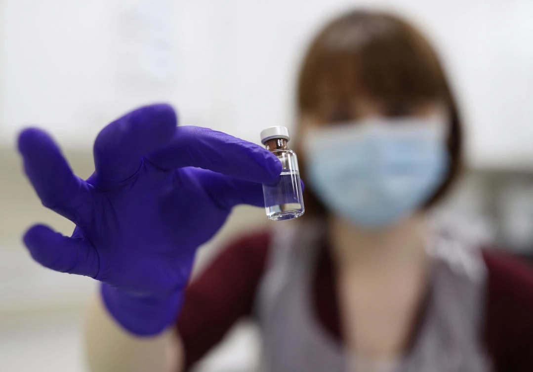 WHO warns virus crisis not over as vaccine rollout starts
