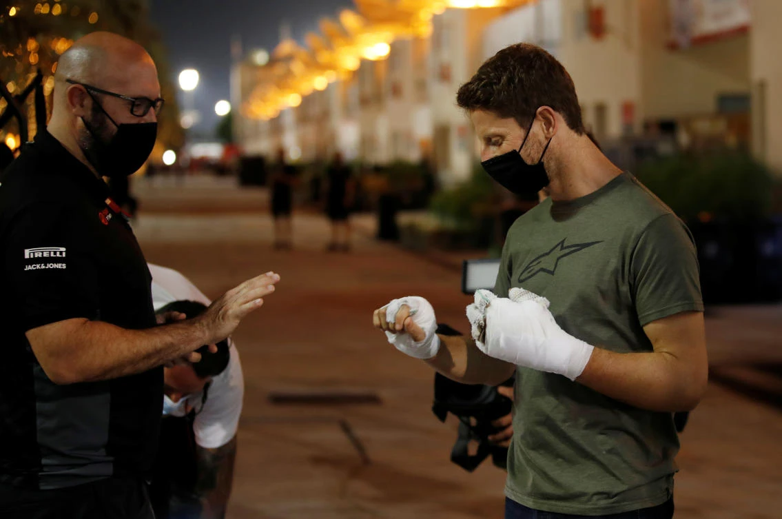 Haas’ Romain Grosjean arrives to thank marshals ahead of the Sakhir Grand Prix in Bahrain. (Reuters)