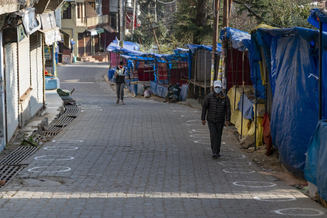 India’s coronavirus infections peaked in September when more than 97,000 cases were reported on a single day. (AP)