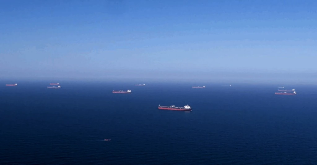 Above, Saudi Aramco tankers are loaded with oil at an undisclosed sea location. (Saudi Aramco via AFP)