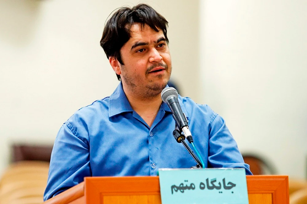 Ruhollah Zam, a former opposition figure who had lived in exile in France, speaks during his trial at Iran’s Revolutionary Court in Tehran. (Mizan News Agency via AFP)